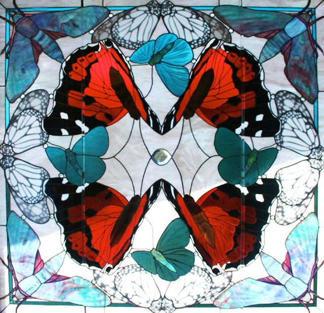 NATIVE JEWELS OF HAWAII, by Calley O'Neill, Designer/Artist and Lamar Yoakum, Master Stained Glass Artisan, Big Island Hawaii.  This window is part of a collection of pieces at The Malamapono Center in Waimea, Hawaii.